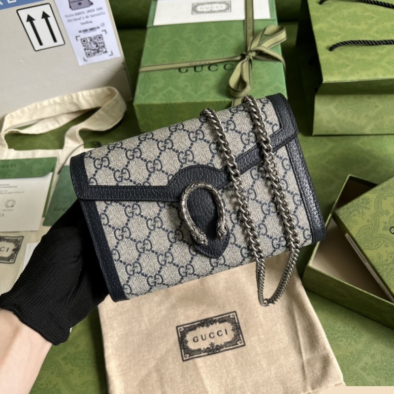 G*u*i clutch bags